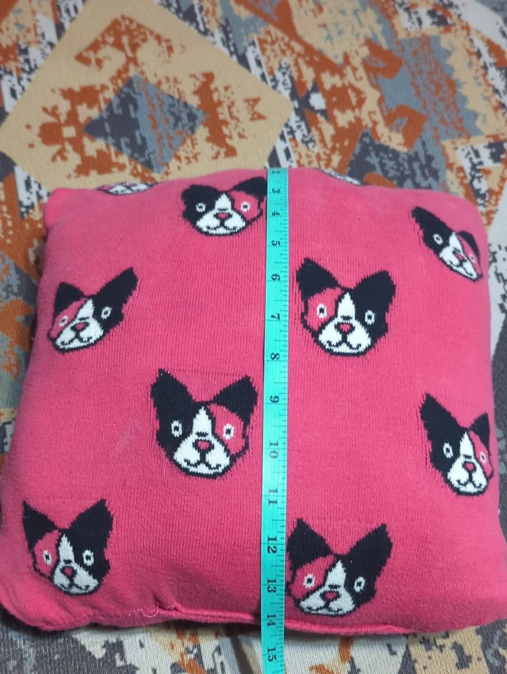 upcycled knit sweaters, featuring a gray pillow with a French bulldog Harlequin